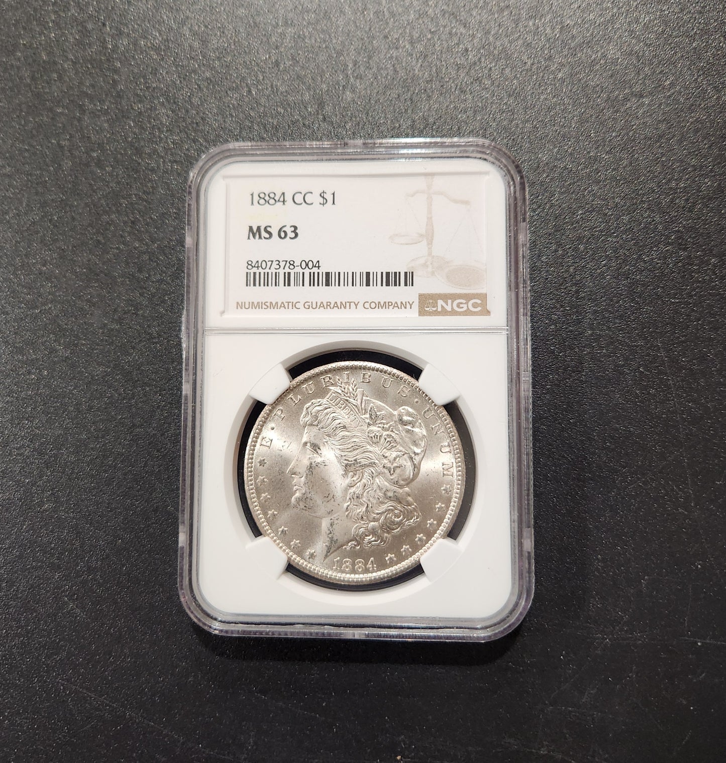 1884 CC NGC MS63 Morgan Silver Dollar